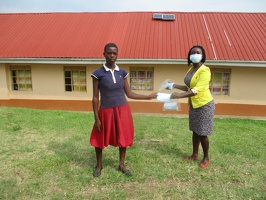 Ainembabazi Sarah p.3 with her face masks (1)