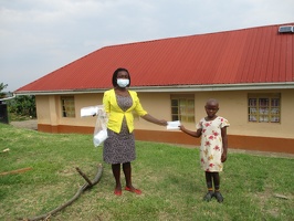 Alinaitwe Esther p.1 with her face masks (2)