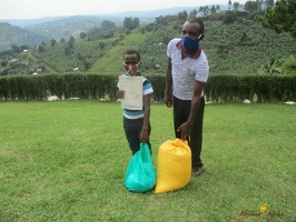 Murungi Innocents family with their food relief (1)