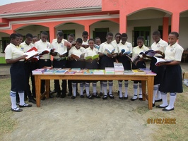 Nyamirima secondary students at a book handover moment