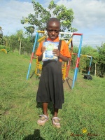 Kamuli Catherine Three Years Old recieves her Needy package